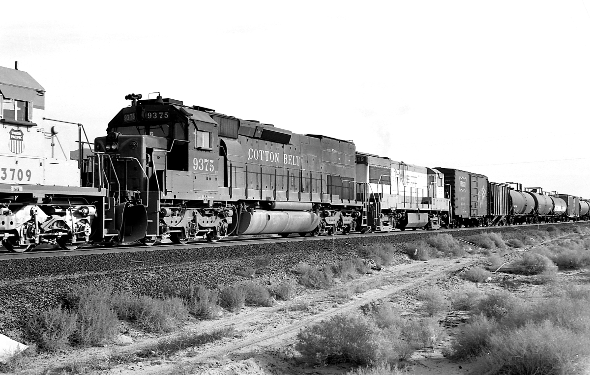 SSW 9375 is a class EMD SD45T-2 and  is pictured in Yermo, California, USA.  This was taken along the Las Vegas/UP on the Cotton Belt (SSW). Photo Copyright: Rick Doughty uploaded to Railroad Gallery on 02/24/2024. This photograph of SSW 9375 was taken on Wednesday, November 26, 1980. All Rights Reserved. 