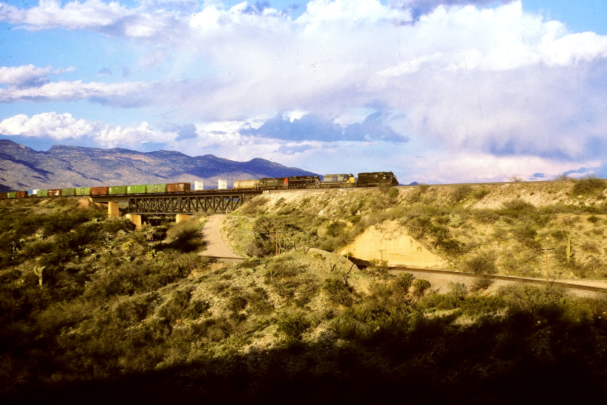 SP 7516 is a class EMD SD45 and  is pictured in Vail, Arizona, USA.  This was taken along the Lordsburg/SP on the Southern Pacific Transportation Company. Photo Copyright: Rick Doughty uploaded to Railroad Gallery on 03/02/2024. This photograph of SP 7516 was taken on Friday, March 17, 1995. All Rights Reserved. 