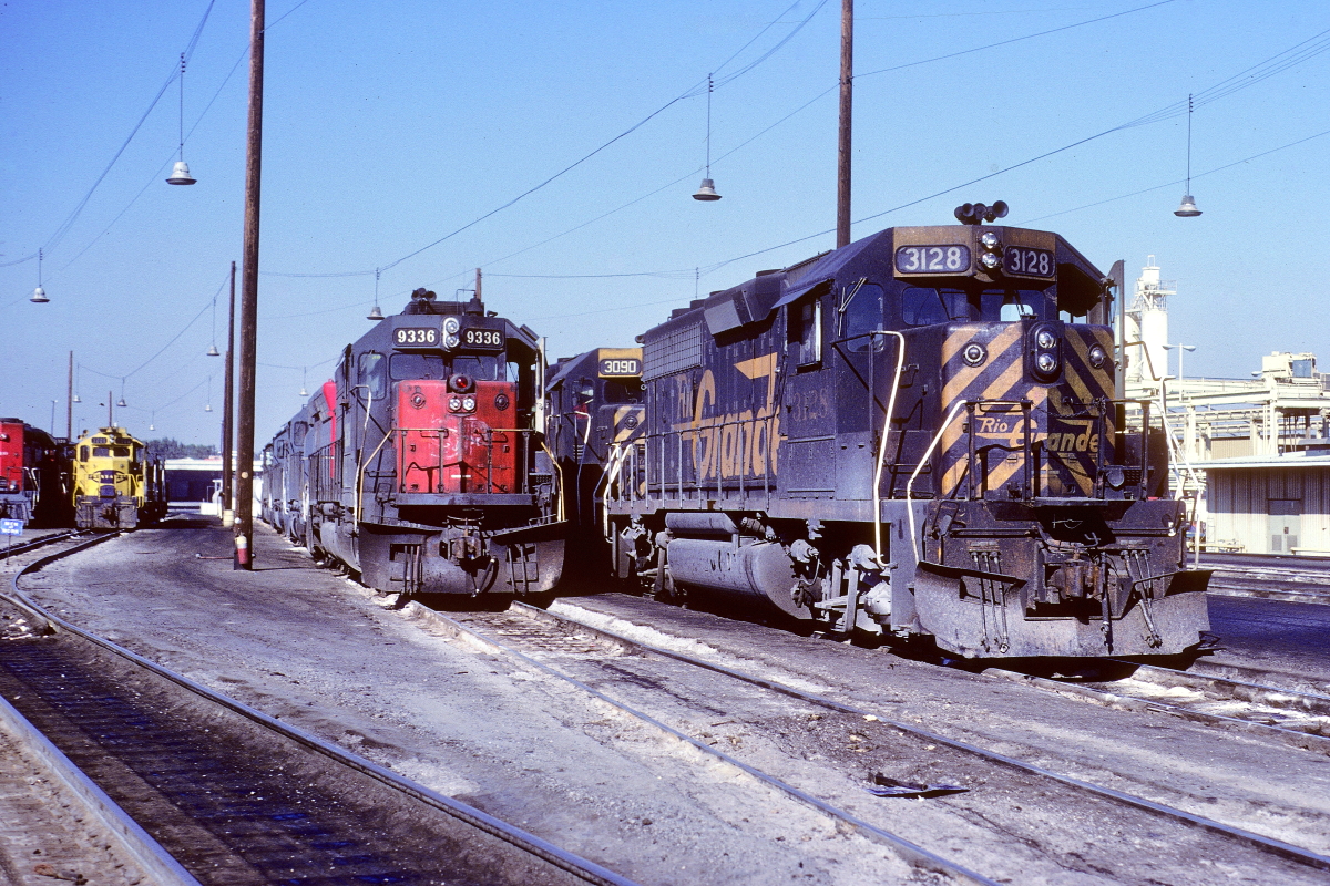 RG 3128 is a class EMD GP40-2 and  is pictured in West Colton, California, USA.  This was taken along the Los Angeles/SP on the Denver and Rio Grande Western Railroad. Photo Copyright: Rick Doughty uploaded to Railroad Gallery on 03/11/2024. This photograph of RG 3128 was taken on Saturday, June 15, 1985. All Rights Reserved. 