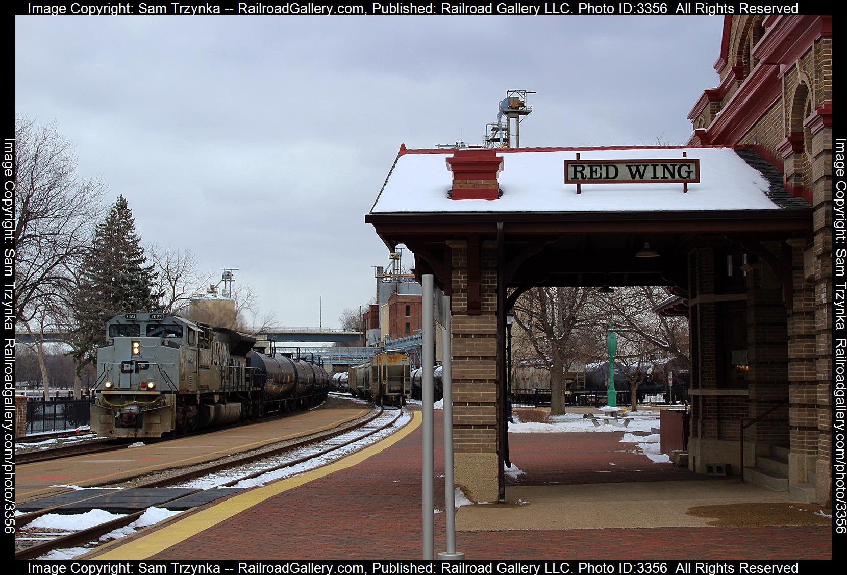 CP 7023 is a class EMD SD70ACU and  is pictured in Red Wing, Minnesota, USA.  This was taken along the CPKC River Subdivision on the CPKC Railway. Photo Copyright: Sam Trzynka uploaded to Railroad Gallery on 05/06/2024. This photograph of CP 7023 was taken on Friday, March 22, 2024. All Rights Reserved. 