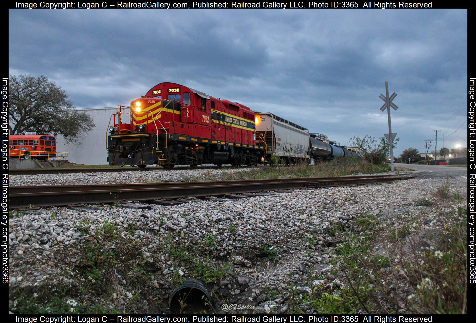 FCEN 7032 is a class GP9RM and  is pictured in Orlando, Florida, USA.  This was taken along the Silver Star Branch on the Florida Central Railroad. Photo Copyright: Logan C uploaded to Railroad Gallery on 05/09/2024. This photograph of FCEN 7032 was taken on Friday, February 23, 2024. All Rights Reserved. 