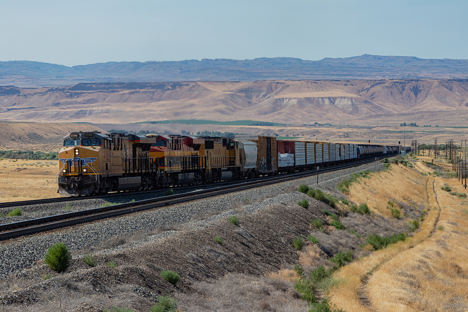 UP 2769 is a class ES44AH and  is pictured in King Hill, Idaho, United States.  This was taken along the Nampa Subdivision on the Union Pacific Railroad. Photo Copyright: Jason Wilson uploaded to Railroad Gallery on 05/09/2024. This photograph of UP 2769 was taken on Wednesday, July 13, 2022. All Rights Reserved. 