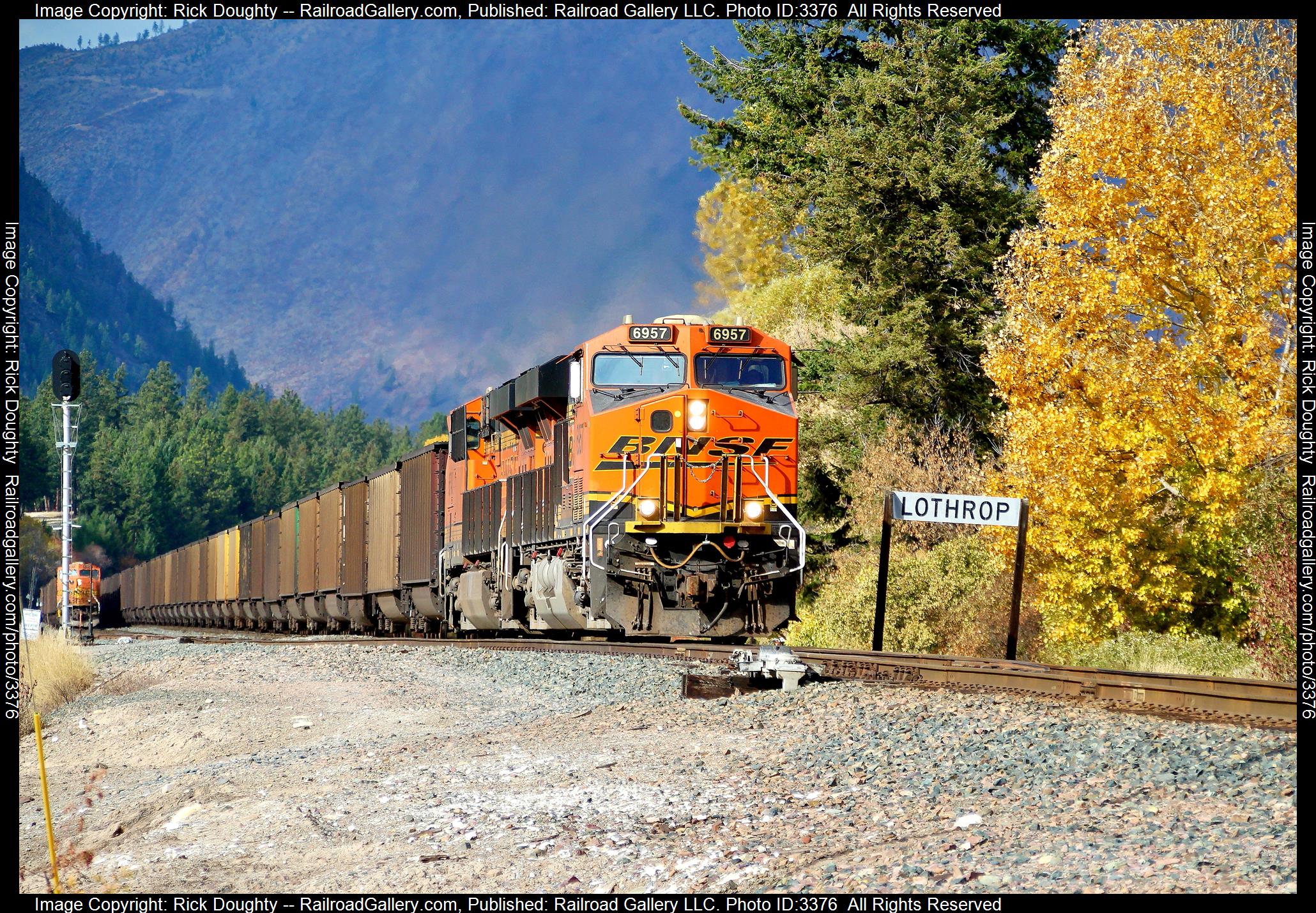 BNSF 6957 is a class GE ES44AC and  is pictured in Lathrop, Montana, USA.  This was taken along the 4th/MRL on the BNSF Railway. Photo Copyright: Rick Doughty uploaded to Railroad Gallery on 05/11/2024. This photograph of BNSF 6957 was taken on Wednesday, October 20, 2021. All Rights Reserved. 