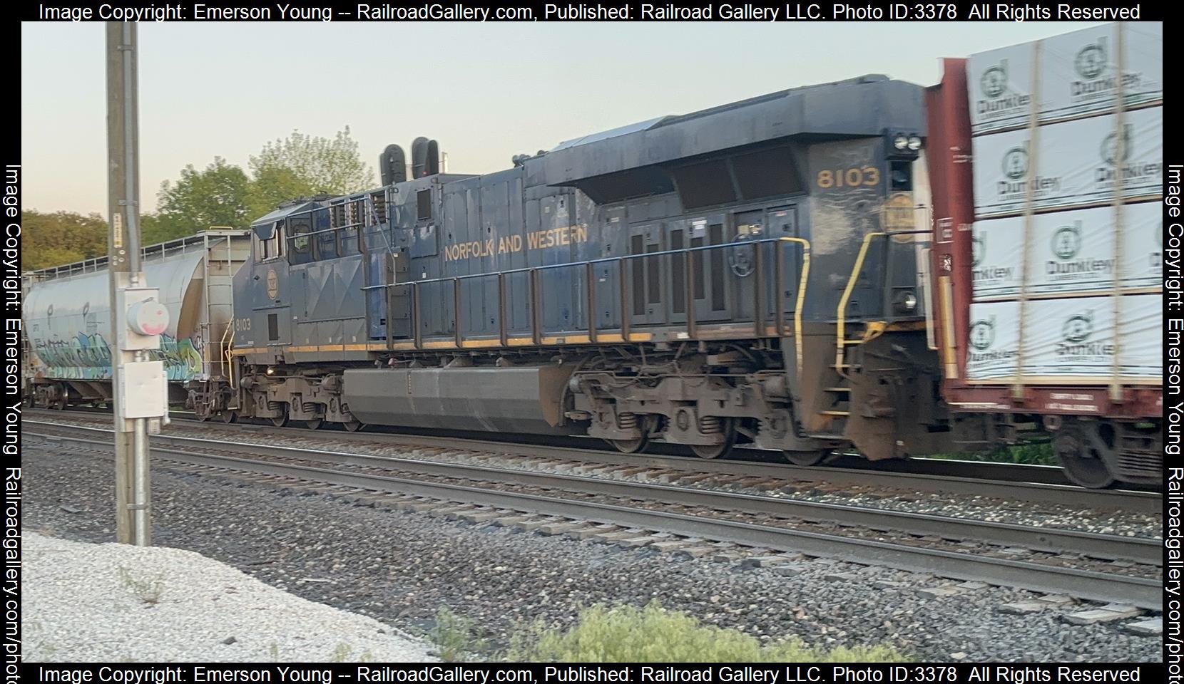 NS 8103 is a class GE ES44AC and  is pictured in Attica , Ohio , USA.  This was taken along the CSX Willard Subdivision  on the Norfolk Southern. Photo Copyright: Emerson Young uploaded to Railroad Gallery on 05/11/2024. This photograph of NS 8103 was taken on Friday, May 10, 2024. All Rights Reserved. 