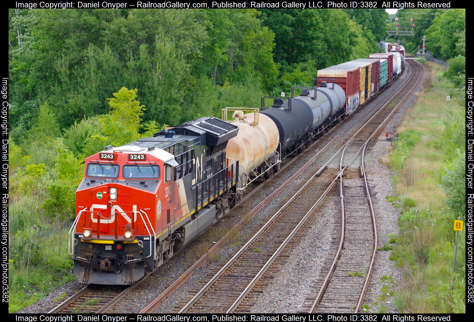 CN 3243 is a class GE ET44AC and  is pictured in Brockville, Ontario, Canada.  This was taken along the Kingston Subdivision on the Canadian National Railway. Photo Copyright: Daniel Onyper uploaded to Railroad Gallery on 05/12/2024. This photograph of CN 3243 was taken on Sunday, August 13, 2023. All Rights Reserved. 