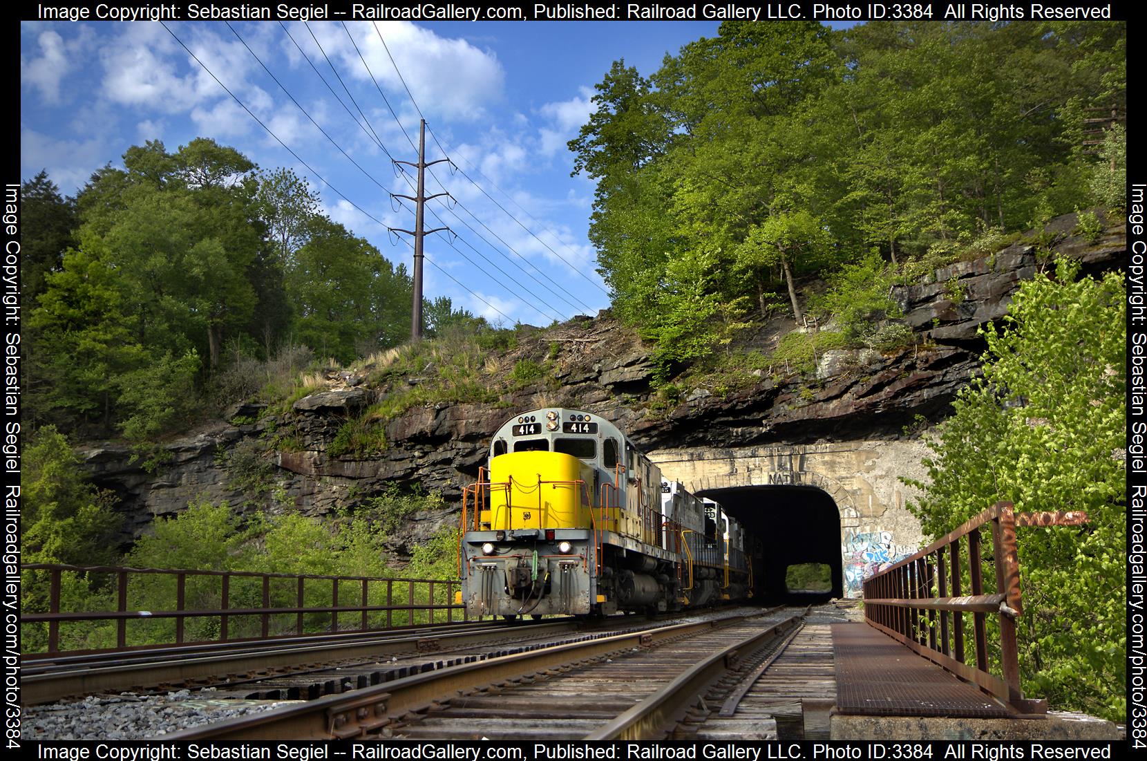 414 is a class Alco C420 and  is pictured in Scranton, Pennsylvania, United States.  This was taken along the Pocono Mainline on the Delaware Lackawanna. Photo Copyright: Sebastian Segiel uploaded to Railroad Gallery on 05/14/2024. This photograph of 414 was taken on Monday, May 13, 2024. All Rights Reserved. 