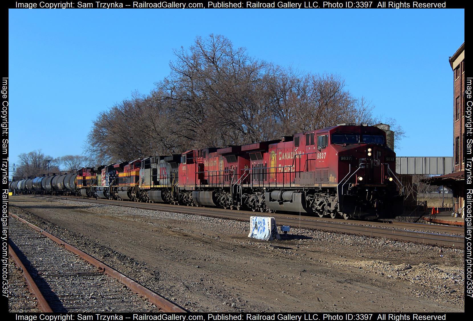 CP 9837 is a class GE AC4400CW and  is pictured in Minneapolis, Minnesota, USA.  This was taken along the BNSF Midway Subdivision on the CPKC Railway. Photo Copyright: Sam Trzynka uploaded to Railroad Gallery on 05/18/2024. This photograph of CP 9837 was taken on Saturday, April 06, 2024. All Rights Reserved. 