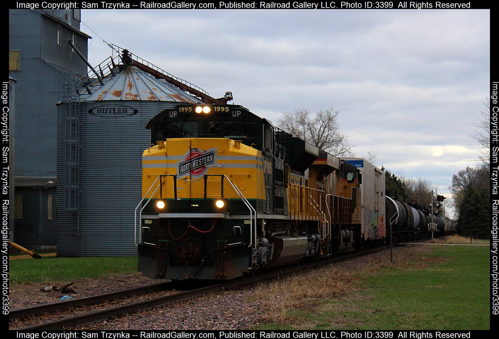 UP 1995 is a class EMD SD70ACe and  is pictured in Farmington, Minnesota, USA.  This was taken along the UP Albert Lea Subdivision on the Union Pacific Railroad. Photo Copyright: Sam Trzynka uploaded to Railroad Gallery on 05/19/2024. This photograph of UP 1995 was taken on Friday, April 19, 2024. All Rights Reserved. 