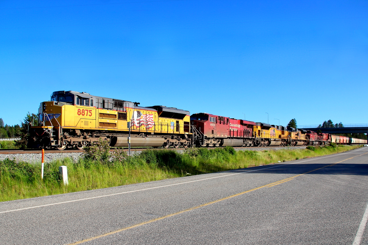 UP 8875 is a class EMD SD70ACe and  is pictured in Athol, Idaho, USA.  This was taken along the Spokane/UP on the Union Pacific Railroad. Photo Copyright: Rick Doughty uploaded to Railroad Gallery on 05/20/2024. This photograph of UP 8875 was taken on Thursday, June 23, 2022. All Rights Reserved. 