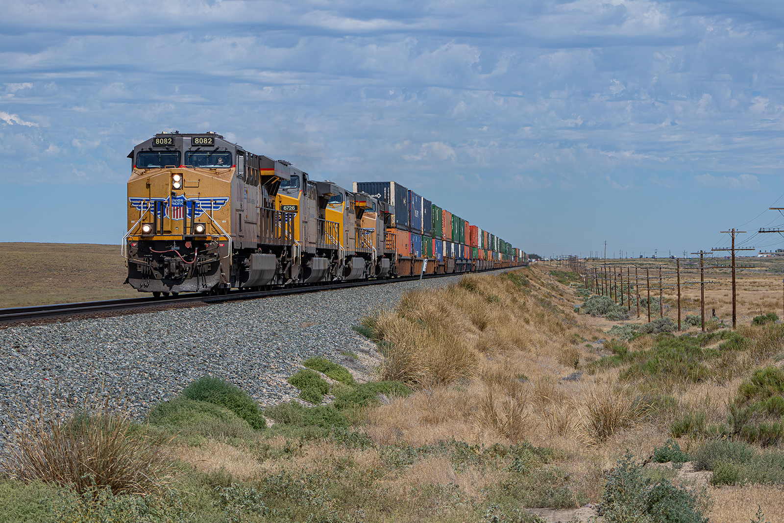 UP 8082 is a class ES44AH and  is pictured in Cleft, Idaho, United States.  This was taken along the Nampa Subdivision on the Union Pacific Railroad. Photo Copyright: Jason Wilson uploaded to Railroad Gallery on 05/21/2024. This photograph of UP 8082 was taken on Sunday, July 30, 2023. All Rights Reserved. 