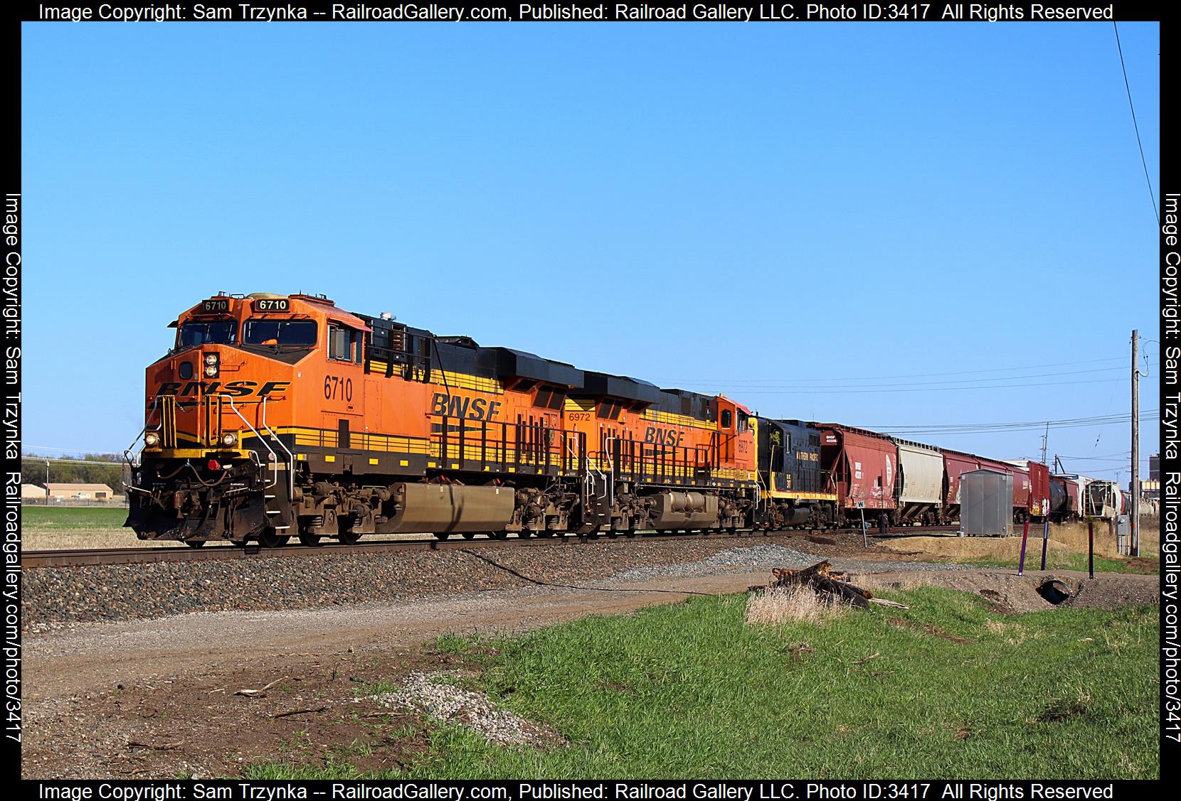 BNSF 6710 is a class GE ES44C4 and  is pictured in Cottage Grove, Minnesota, USA.  This was taken along the BNSF St. Paul Subdivision on the BNSF Railway. Photo Copyright: Sam Trzynka uploaded to Railroad Gallery on 05/22/2024. This photograph of BNSF 6710 was taken on Wednesday, April 24, 2024. All Rights Reserved. 