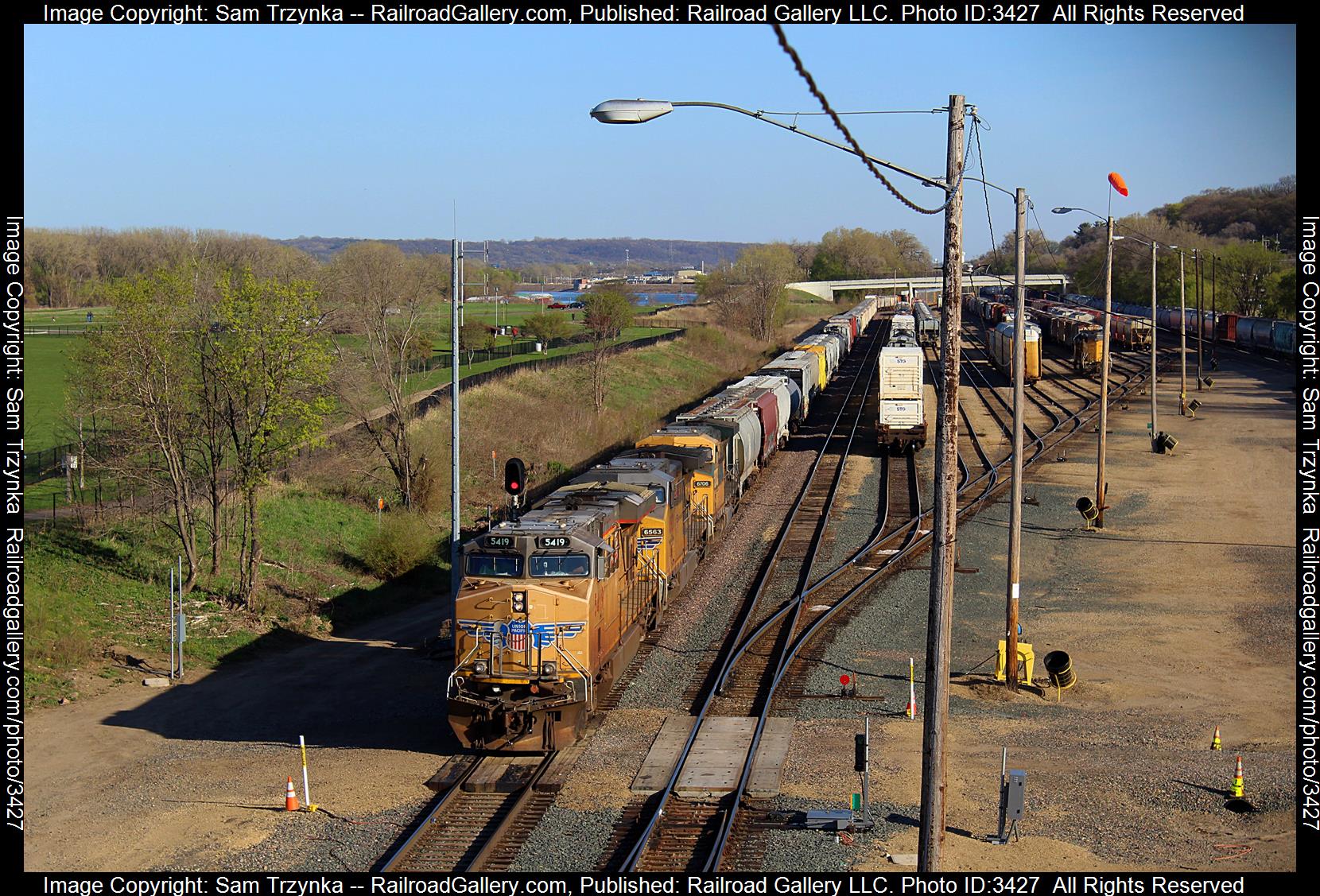 UP 5419 is a class GE ES44AC and  is pictured in South St. Paul, Minnesota, USA.  This was taken along the UP Albert Lea Subdivision on the Union Pacific Railroad. Photo Copyright: Sam Trzynka uploaded to Railroad Gallery on 05/24/2024. This photograph of UP 5419 was taken on Wednesday, April 24, 2024. All Rights Reserved. 