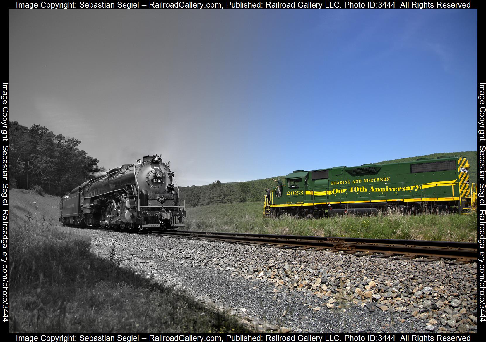 2102 / 2023 is a class 4-8-4 / GP38-2 and  is pictured in Jim Thorpe, Pennsylvania, United States.  This was taken along the Jim Thorpe on the Reading Blue Mountain and Northern Railroad. Photo Copyright: Sebastian Segiel uploaded to Railroad Gallery on 05/28/2024. This photograph of 2102 / 2023 was taken on Saturday, May 25, 2024. All Rights Reserved. 