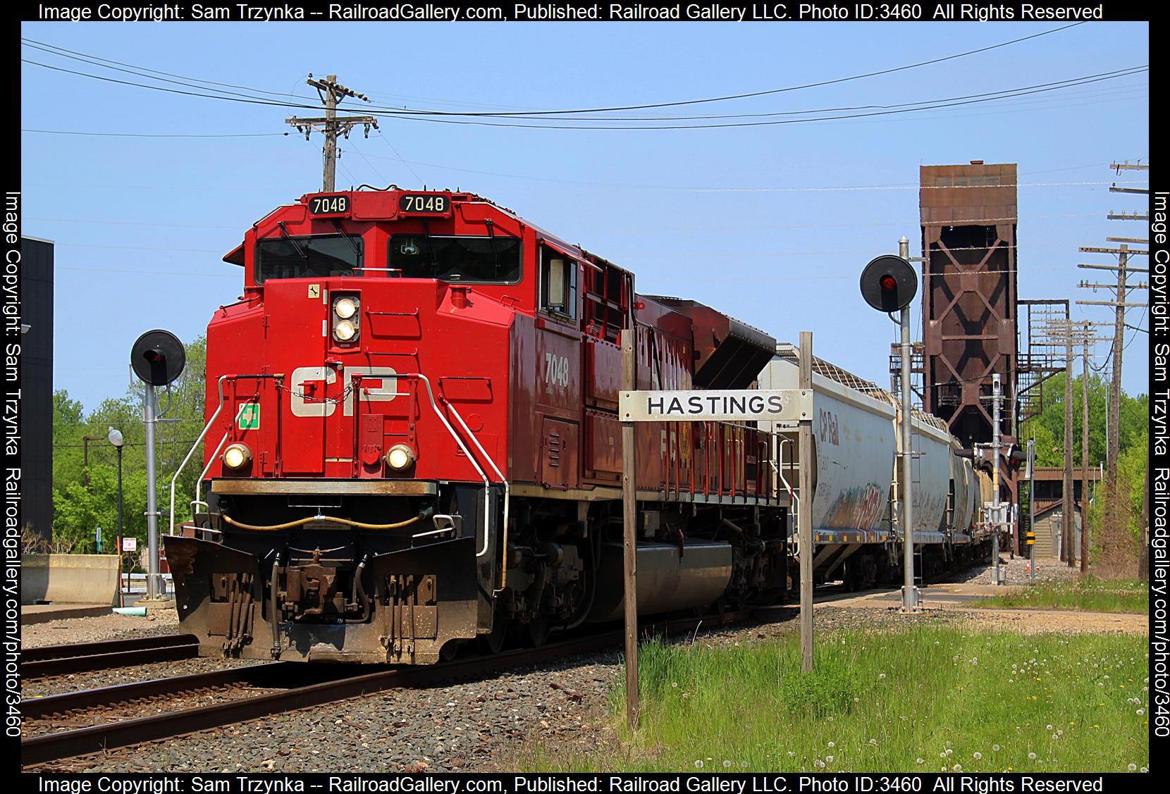 CP 7048 is a class EMD SD70ACU and  is pictured in Hastings, Minnesota, USA.  This was taken along the CPKC River Subdivision on the CPKC Railway. Photo Copyright: Sam Trzynka uploaded to Railroad Gallery on 05/30/2024. This photograph of CP 7048 was taken on Saturday, May 11, 2024. All Rights Reserved. 