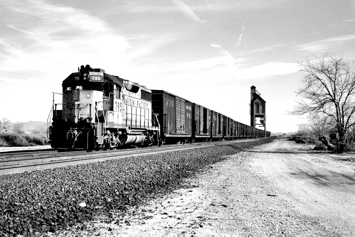 UP 795 is a class EMD GP35 and  is pictured in Bowie, Arizona, USA.  This was taken along the Lordsburg/SP on the Union Pacific Railroad. Photo Copyright: Rick Doughty uploaded to Railroad Gallery on 05/31/2024. This photograph of UP 795 was taken on Saturday, February 18, 1989. All Rights Reserved. 