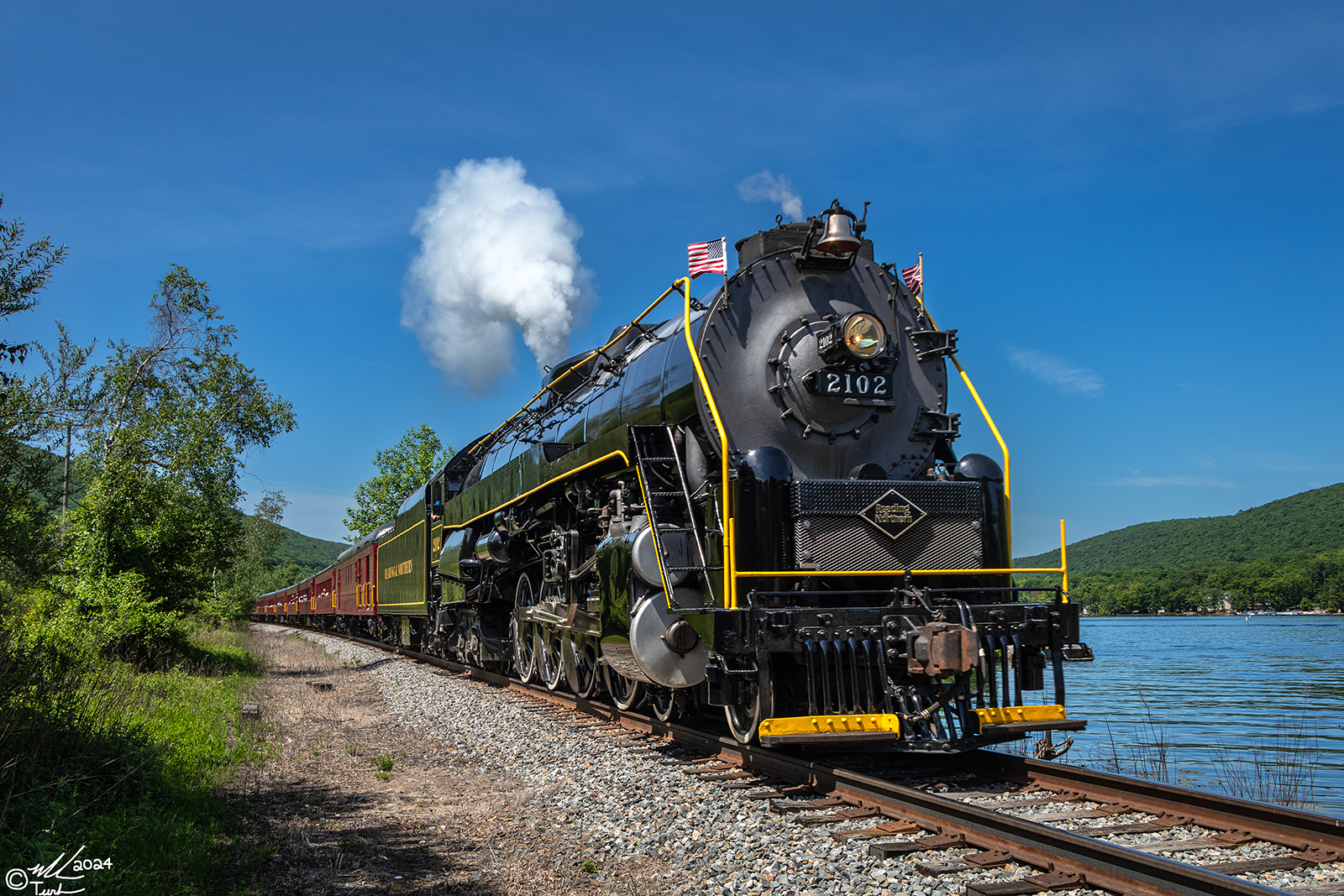 RDG 2102 is a class T-1 and  is pictured in Nesquehoning, Pennsylvania, USA.  This was taken along the Lake Hauto on the Reading Company. Photo Copyright: Mark Turkovich uploaded to Railroad Gallery on 06/03/2024. This photograph of RDG 2102 was taken on Saturday, May 25, 2024. All Rights Reserved. 