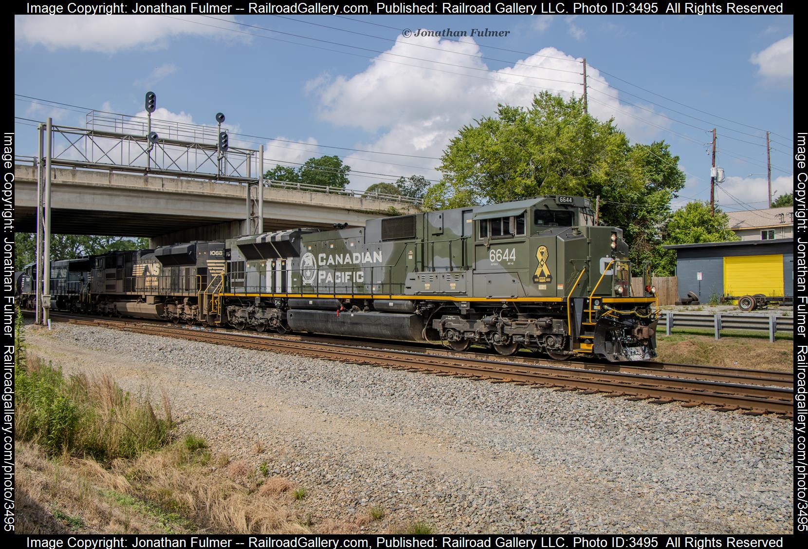 CP 6644 is a class EMD SD70ACU and  is pictured in Stockbridge, Georgia, United States.  This was taken along the Norfolk Southern Atlanta South End on the Canadian Pacific Railway. Photo Copyright: Jonathan Fulmer uploaded to Railroad Gallery on 06/07/2024. This photograph of CP 6644 was taken on Thursday, June 06, 2024. All Rights Reserved. 