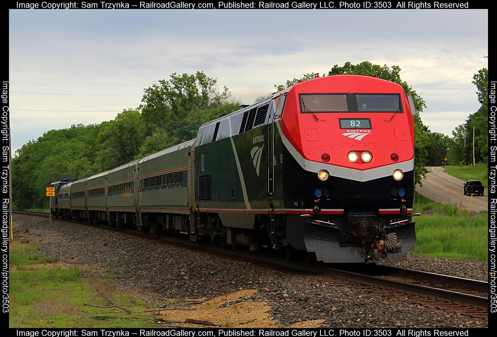 AMTK 82 is a class GE P42DC and  is pictured in Ravenna Township, Minnesota, USA.  This was taken along the CPKC River Subdivision on the Amtrak. Photo Copyright: Sam Trzynka uploaded to Railroad Gallery on 06/10/2024. This photograph of AMTK 82 was taken on Saturday, May 25, 2024. All Rights Reserved. 