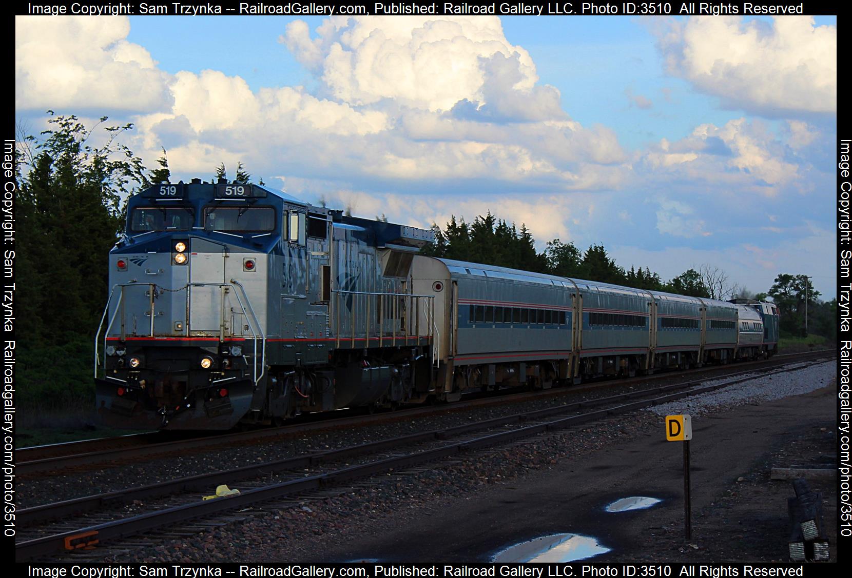 AMTK 519 is a class GE P32BWH (Dash 8-32BWH) and  is pictured in Welch Twp, Minnesota, USA.  This was taken along the CPKC River Subdivision on the Amtrak. Photo Copyright: Sam Trzynka uploaded to Railroad Gallery on 06/12/2024. This photograph of AMTK 519 was taken on Monday, June 03, 2024. All Rights Reserved. 