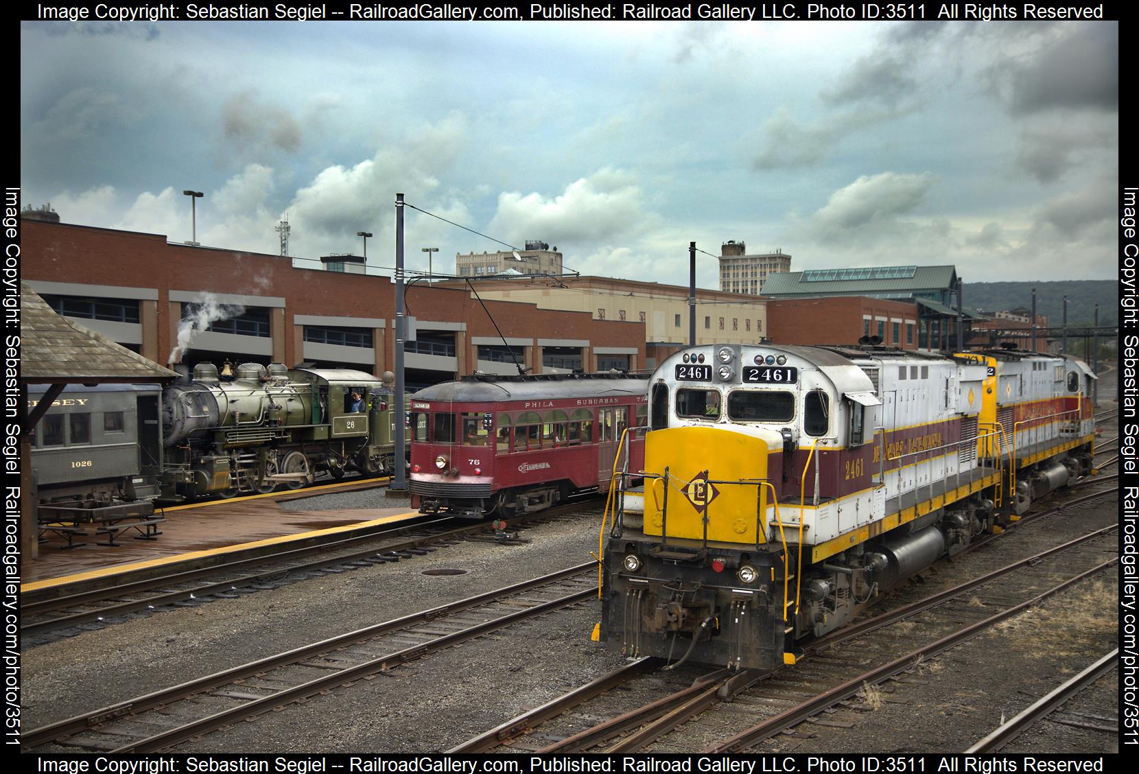 2461 / 76 / 26 is a class C425 / Trolley / 0-6-0 and  is pictured in Scranton, Pennsylvania, United States.  This was taken along the Delaware Lackawanna Steamtown Yard on the Delaware Lackawanna. Photo Copyright: Sebastian Segiel uploaded to Railroad Gallery on 06/13/2024. This photograph of 2461 / 76 / 26 was taken on Thursday, May 23, 2024. All Rights Reserved. 