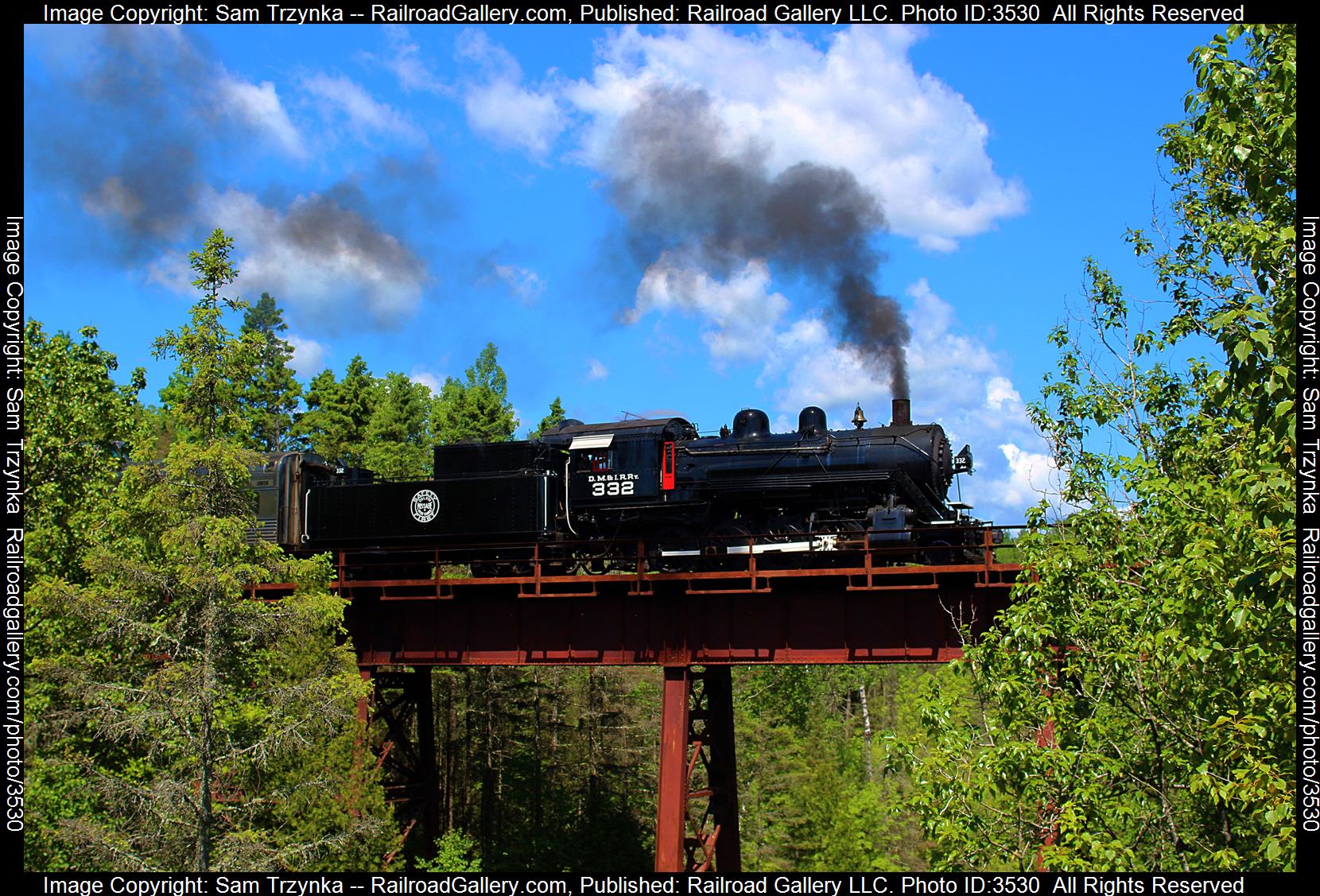 DMIR 332 is a class Alco 2-8-0 and  is pictured in Palmers, Minnesota, USA.  This was taken along the North Shore Scenic Railroad on the Duluth, Missabe, & Iron Range. Photo Copyright: Sam Trzynka uploaded to Railroad Gallery on 06/22/2024. This photograph of DMIR 332 was taken on Saturday, June 08, 2024. All Rights Reserved. 