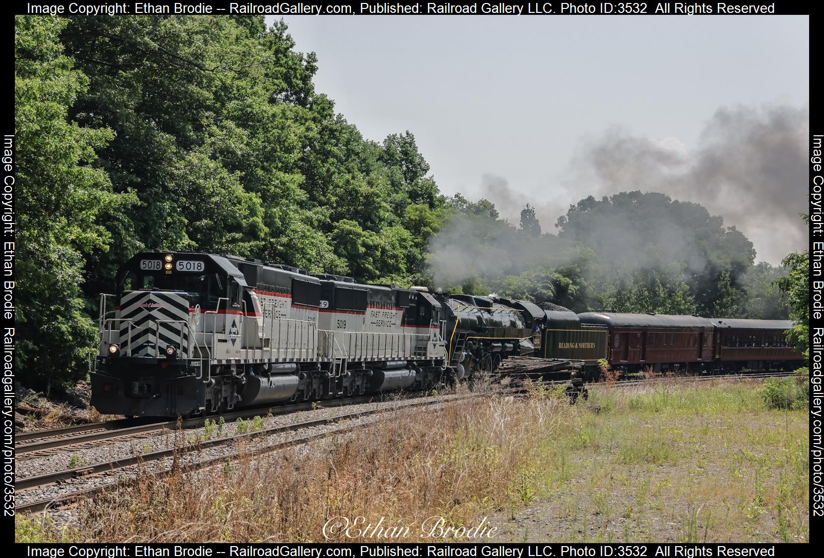 2102, 5018, 5019 is a class 4-8-4, SD50-2 and  is pictured in Pittston, Pennsylvania, United States.  This was taken along the Lehigh Line on the Reading Blue Mountain and Northern Railroad. Photo Copyright: Ethan Brodie uploaded to Railroad Gallery on 06/23/2024. This photograph of 2102, 5018, 5019 was taken on Saturday, June 22, 2024. All Rights Reserved. 