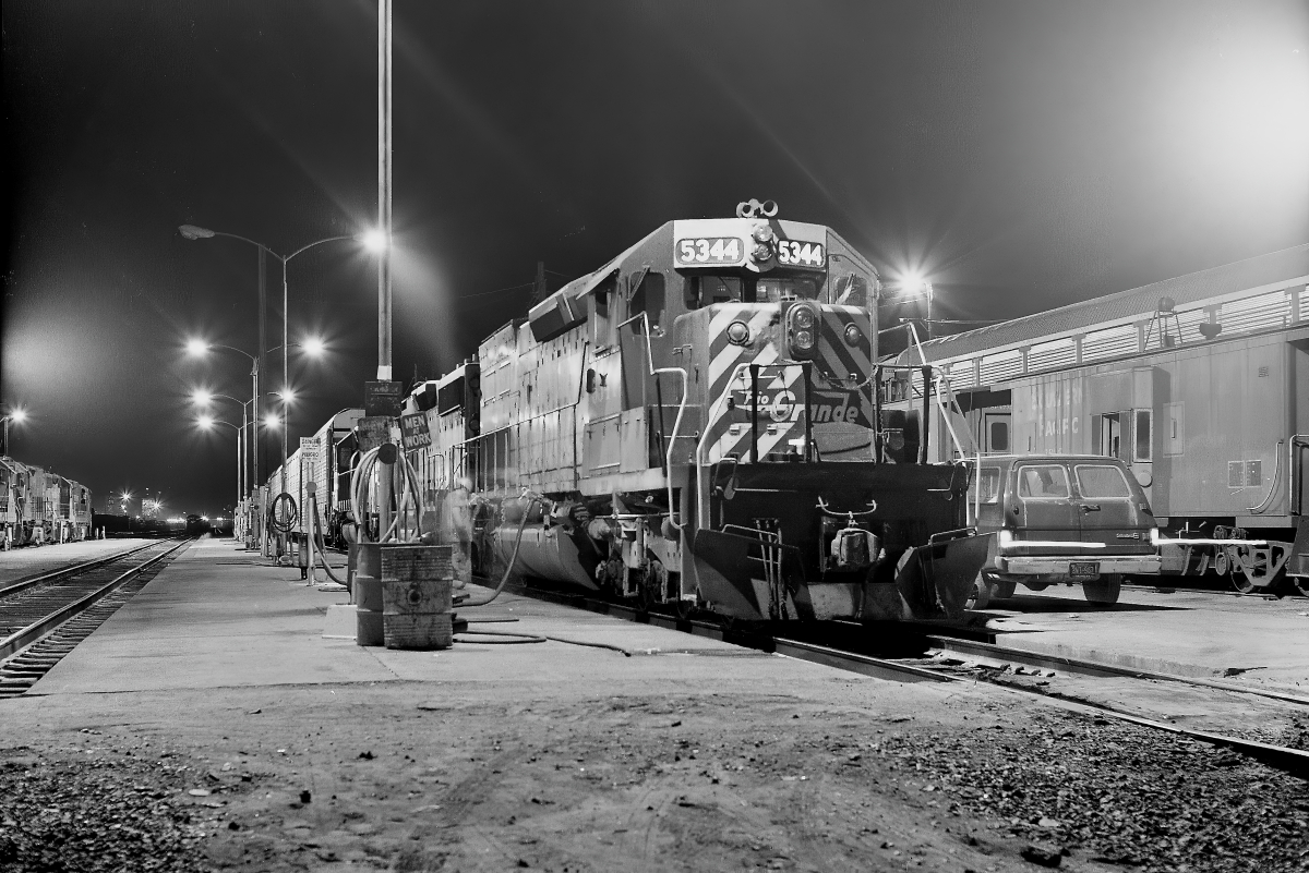 DRGW 5344 is a class EMD SD40T-2 and  is pictured in Tucson, Arizona, USA.  This was taken along the Lordsburg/SP on the Denver and Rio Grande Western Railroad. Photo Copyright: Rick Doughty uploaded to Railroad Gallery on 06/25/2024. This photograph of DRGW 5344 was taken on Saturday, November 14, 1987. All Rights Reserved. 