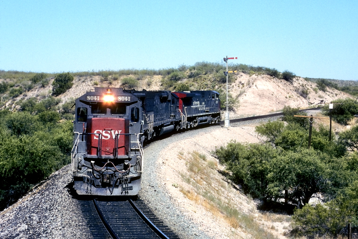 SSW 8041 is a class GE B40-8 (Dash 8-40B) and  is pictured in Mescal, Arizona, USA.  This was taken along the Lordsburg/SP on the Southern Pacific Transportation Company. Photo Copyright: Rick Doughty uploaded to Railroad Gallery on 07/03/2024. This photograph of SSW 8041 was taken on Tuesday, July 04, 1995. All Rights Reserved. 