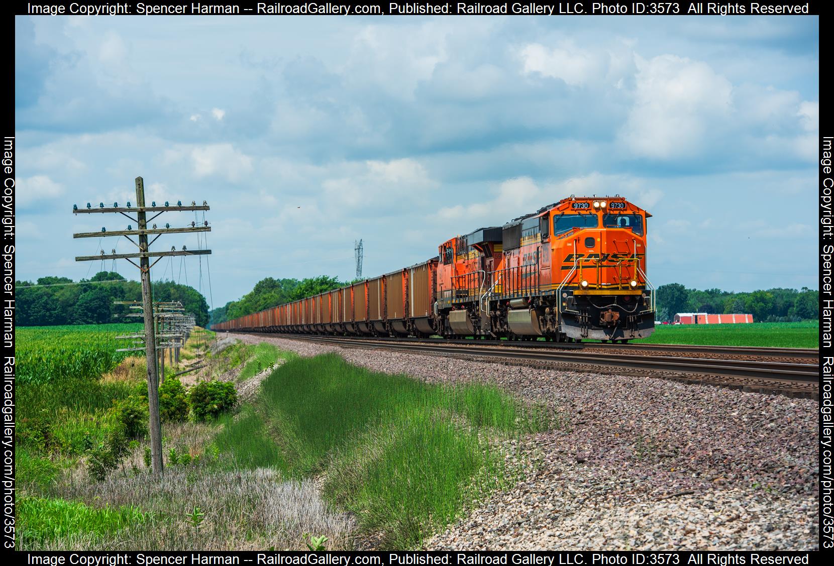 BNSF 9730 is a class EMD SD70MACe and  is pictured in Wawaka, Indiana, USA.  This was taken along the Chicago Line on the Norfolk Southern. Photo Copyright: Spencer Harman uploaded to Railroad Gallery on 07/11/2024. This photograph of BNSF 9730 was taken on Thursday, July 11, 2024. All Rights Reserved. 