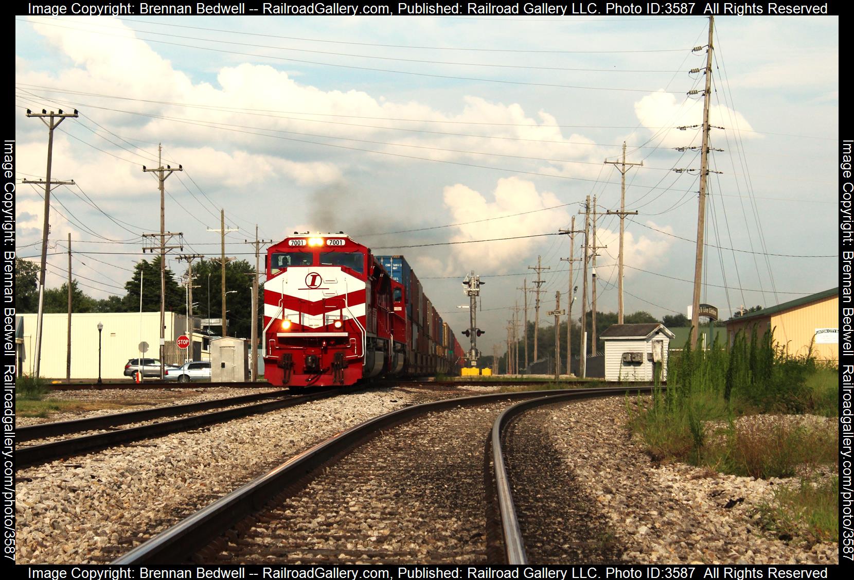 INRD 7001 is a class SD70M and  is pictured in Linton, Indiana, United States.  This was taken along the Indianapolis Subdivision on the Indiana Rail Road. Photo Copyright: Brennan Bedwell uploaded to Railroad Gallery on 07/17/2024. This photograph of INRD 7001 was taken on Wednesday, July 17, 2024. All Rights Reserved. 