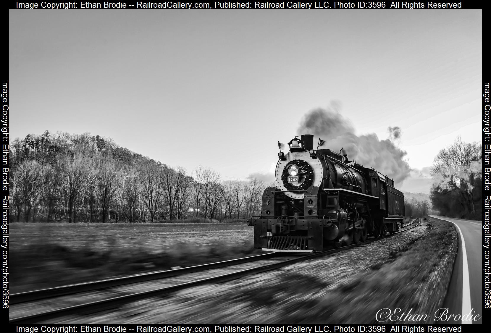 1702 is a class 2-8-0 and  is pictured in Whitter, North Carolina, United States.  This was taken along the Southern Railroad Murphy Branch on the Great Smoky Mountains Railroad. Photo Copyright: Ethan Brodie uploaded to Railroad Gallery on 07/20/2024. This photograph of 1702 was taken on Monday, December 18, 2023. All Rights Reserved. 