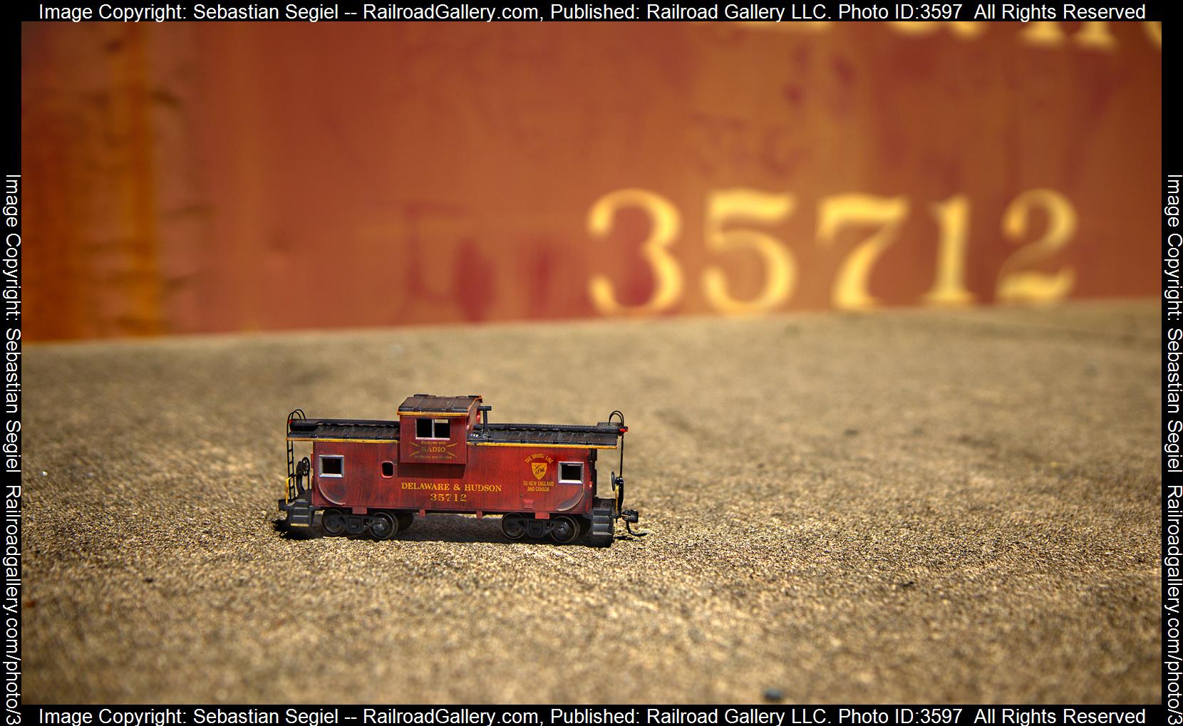 35712 is a class Caboose and  is pictured in Dickson City, Pennsylvania, United States.  This was taken along the Carbondale Line on the Delaware Lackawanna. Photo Copyright: Sebastian Segiel uploaded to Railroad Gallery on 07/21/2024. This photograph of 35712 was taken on Tuesday, July 09, 2024. All Rights Reserved. 