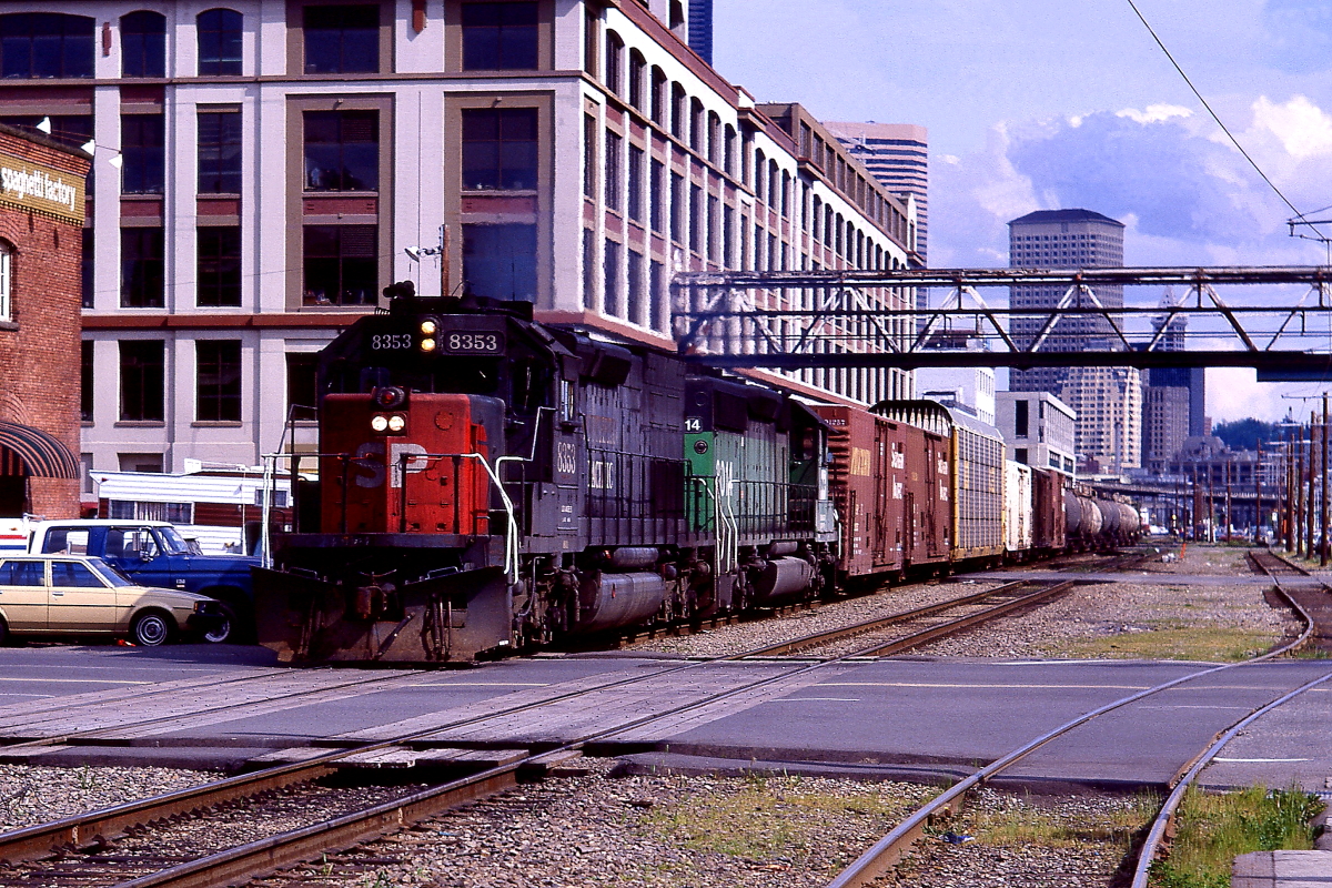 SP 8353 is a class EMD SD40T-2 and  is pictured in Seattle, Washington, USA.  This was taken along the Seattle/BN on the Southern Pacific Transportation Company. Photo Copyright: Rick Doughty uploaded to Railroad Gallery on 07/27/2024. This photograph of SP 8353 was taken on Saturday, June 07, 1986. All Rights Reserved. 