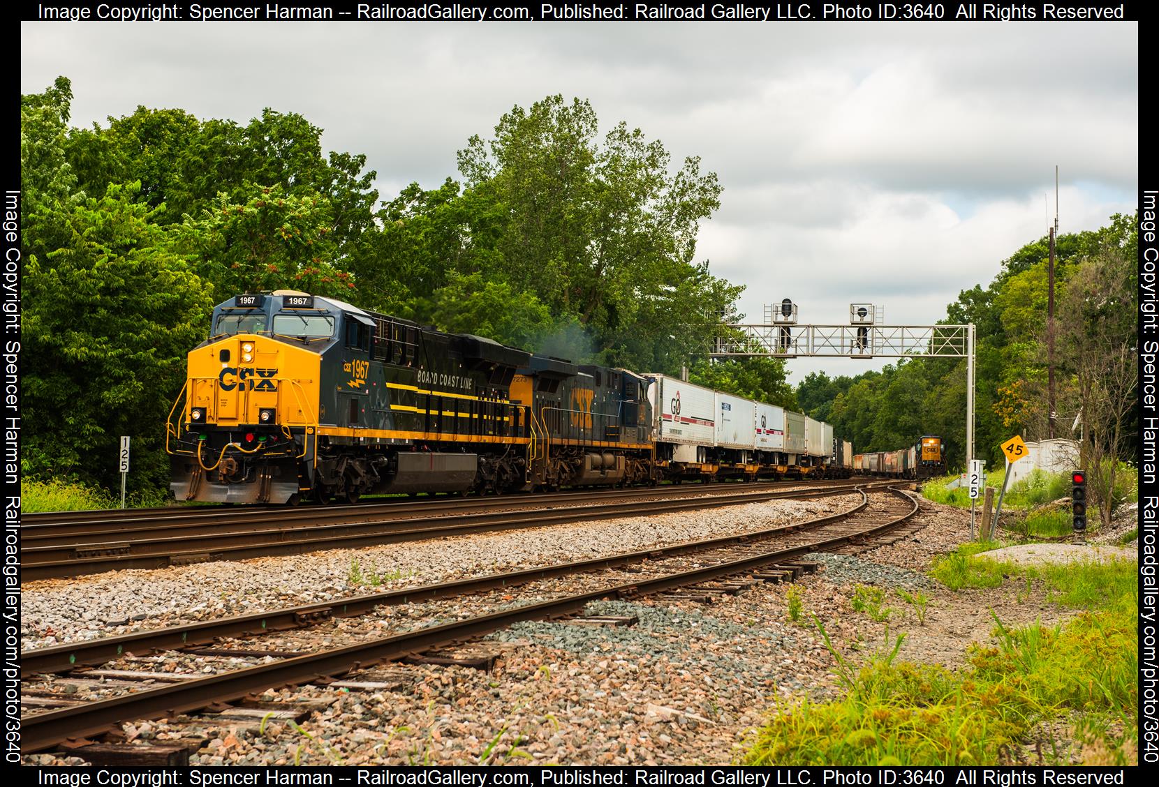 CSXT 1967 is a class GE ES44AC and  is pictured in Auburn, Indiana, USA.  This was taken along the Garrett Subdivision on the CSX Transportation. Photo Copyright: Spencer Harman uploaded to Railroad Gallery on 08/07/2024. This photograph of CSXT 1967 was taken on Wednesday, August 07, 2024. All Rights Reserved. 