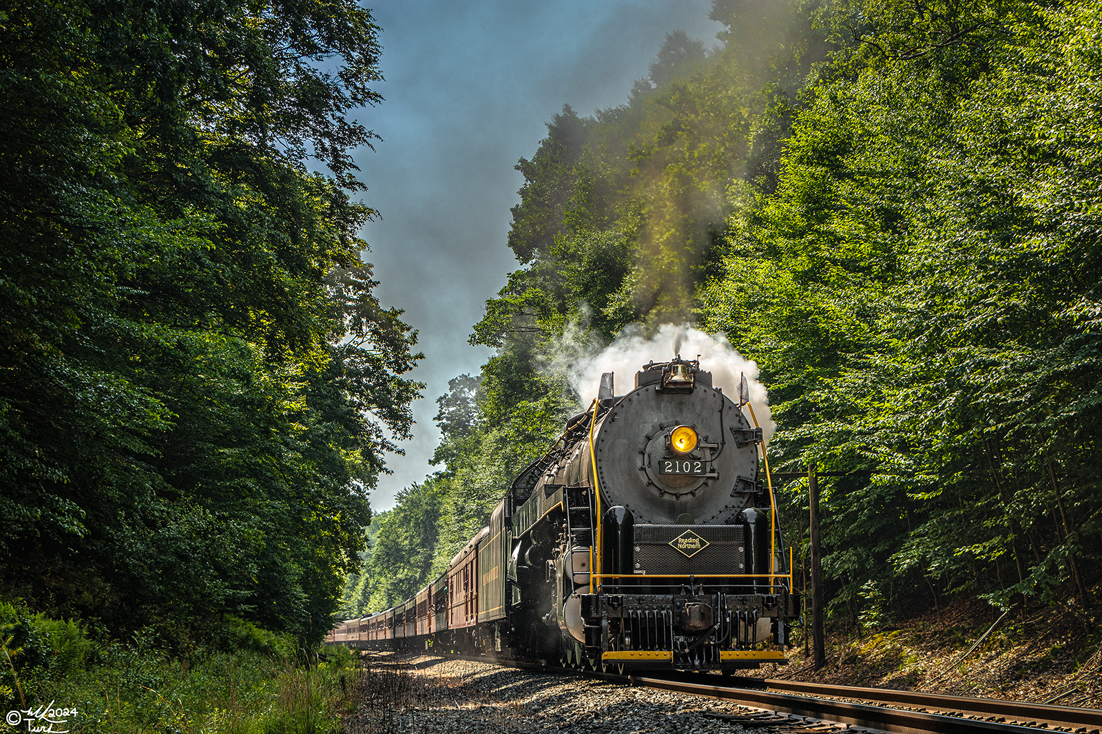 RDG 2102 is a class T-1 and  is pictured in White Haven, Pennsylvania, USA.  This was taken along the Land Grabbers Crossing on the Reading Company. Photo Copyright: Mark Turkovich uploaded to Railroad Gallery on 08/08/2024. This photograph of RDG 2102 was taken on Saturday, June 22, 2024. All Rights Reserved. 