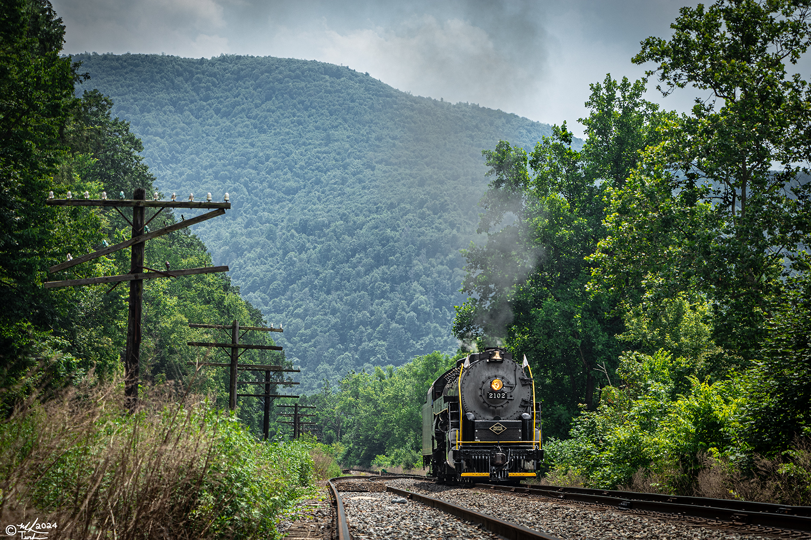 RDG 2102 is a class T-1 and  is pictured in Tunkhannock, Pennsylvania, USA.  This was taken along the Tunkhannock on the Reading Company. Photo Copyright: Mark Turkovich uploaded to Railroad Gallery on 08/08/2024. This photograph of RDG 2102 was taken on Saturday, June 22, 2024. All Rights Reserved. 