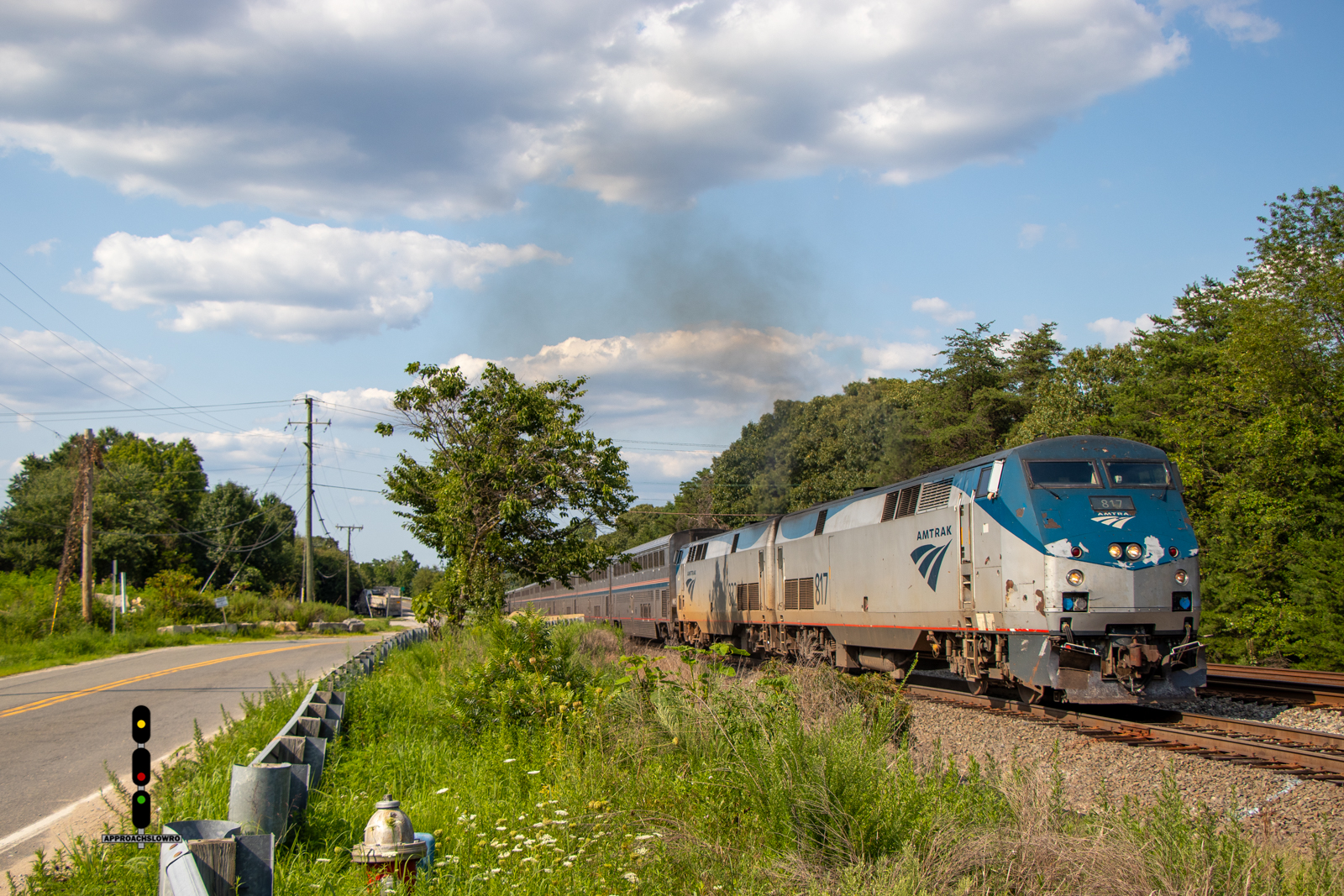 AMTK 817 is a class GE P40DC and  is pictured in Lorton, Virginia, USA.  This was taken along the RF&P Subdivision on the Amtrak. Photo Copyright: ApproachSlowRO   uploaded to Railroad Gallery on 08/09/2024. This photograph of AMTK 817 was taken on Saturday, July 27, 2024. All Rights Reserved. 