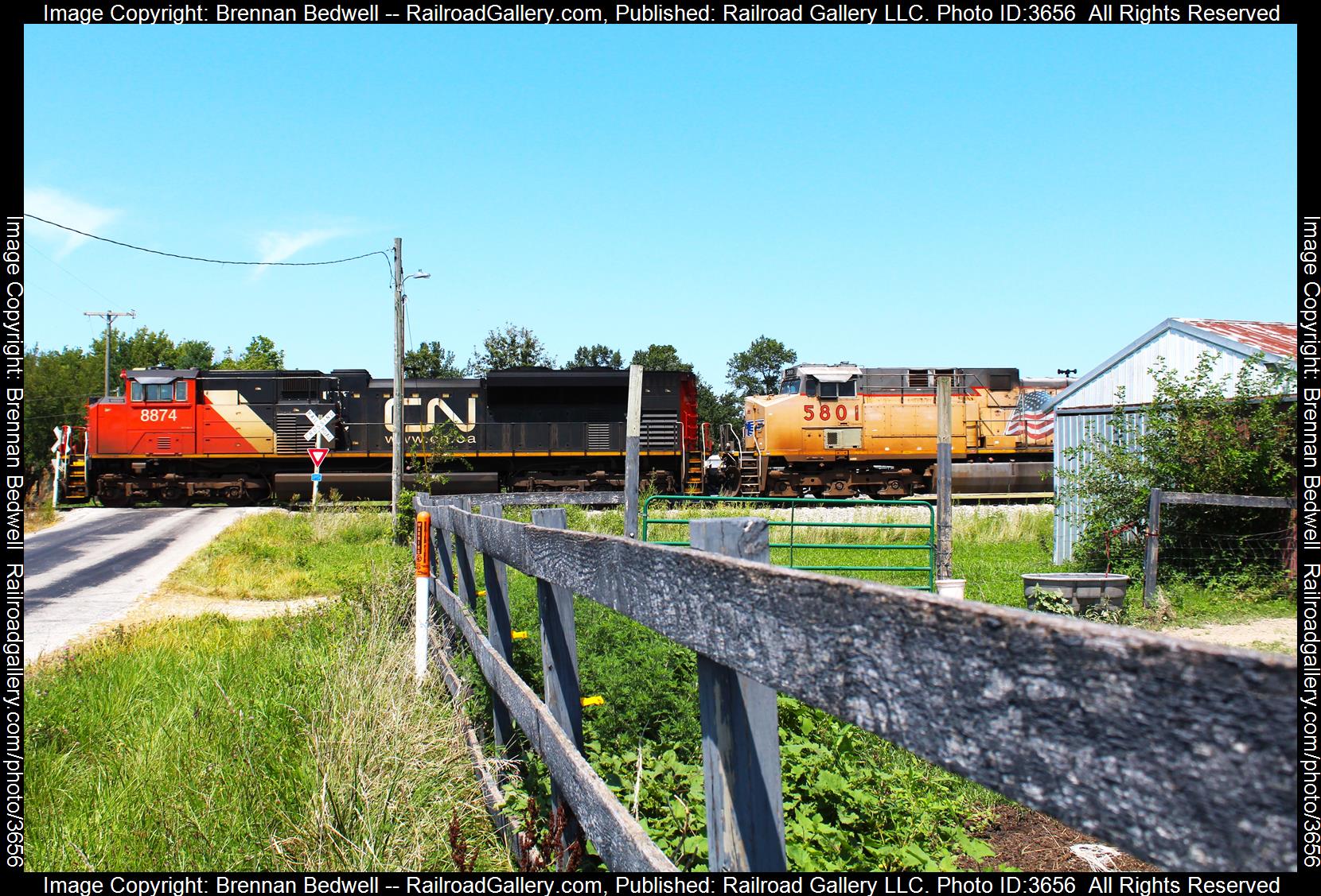 CN 8874 is a class SD70M-2 and  is pictured in Oblong, Illinois, United States.  This was taken along the Indianapolis Subdivision on the Canadian National Railway. Photo Copyright: Brennan Bedwell uploaded to Railroad Gallery on 08/09/2024. This photograph of CN 8874 was taken on Friday, August 09, 2024. All Rights Reserved. 