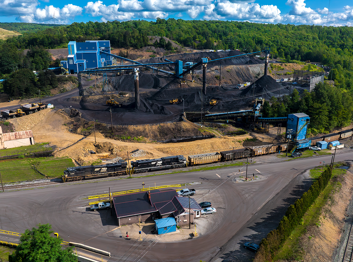 NS 7258 is a class EMD SD70ACU and  is pictured in Portage, Pennsylvania, United States.  This was taken along the NS Pittsburgh line on the Norfolk Southern Railway. Photo Copyright: Robby Lefkowitz uploaded to Railroad Gallery on 08/13/2024. This photograph of NS 7258 was taken on Tuesday, August 13, 2024. All Rights Reserved. 