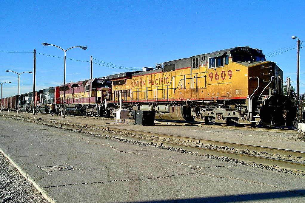 UP 9609 is a class GE C44-9W (Dash 9-44CW) and  is pictured in Tucson, Arizona, USA.  This was taken along the Lordsburg/UP on the Union Pacific Railroad. Photo Copyright: Rick Doughty uploaded to Railroad Gallery on 08/13/2024. This photograph of UP 9609 was taken on Thursday, December 01, 2005. All Rights Reserved. 