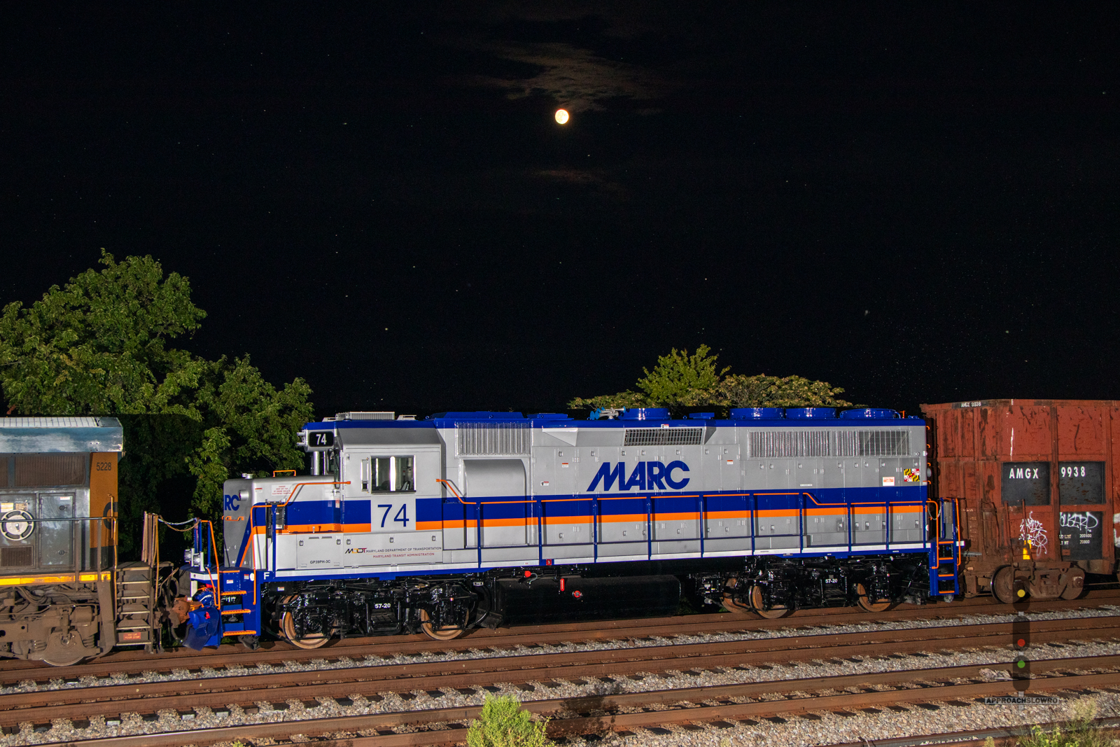 MARC 74 is a class EMD GP39PH-3C and  is pictured in Arlington, Virginia, USA.  This was taken along the RF&P Subdivision on the Maryland Area Rail Commuter. Photo Copyright: ApproachSlowRO   uploaded to Railroad Gallery on 08/19/2024. This photograph of MARC 74 was taken on Saturday, August 17, 2024. All Rights Reserved. 