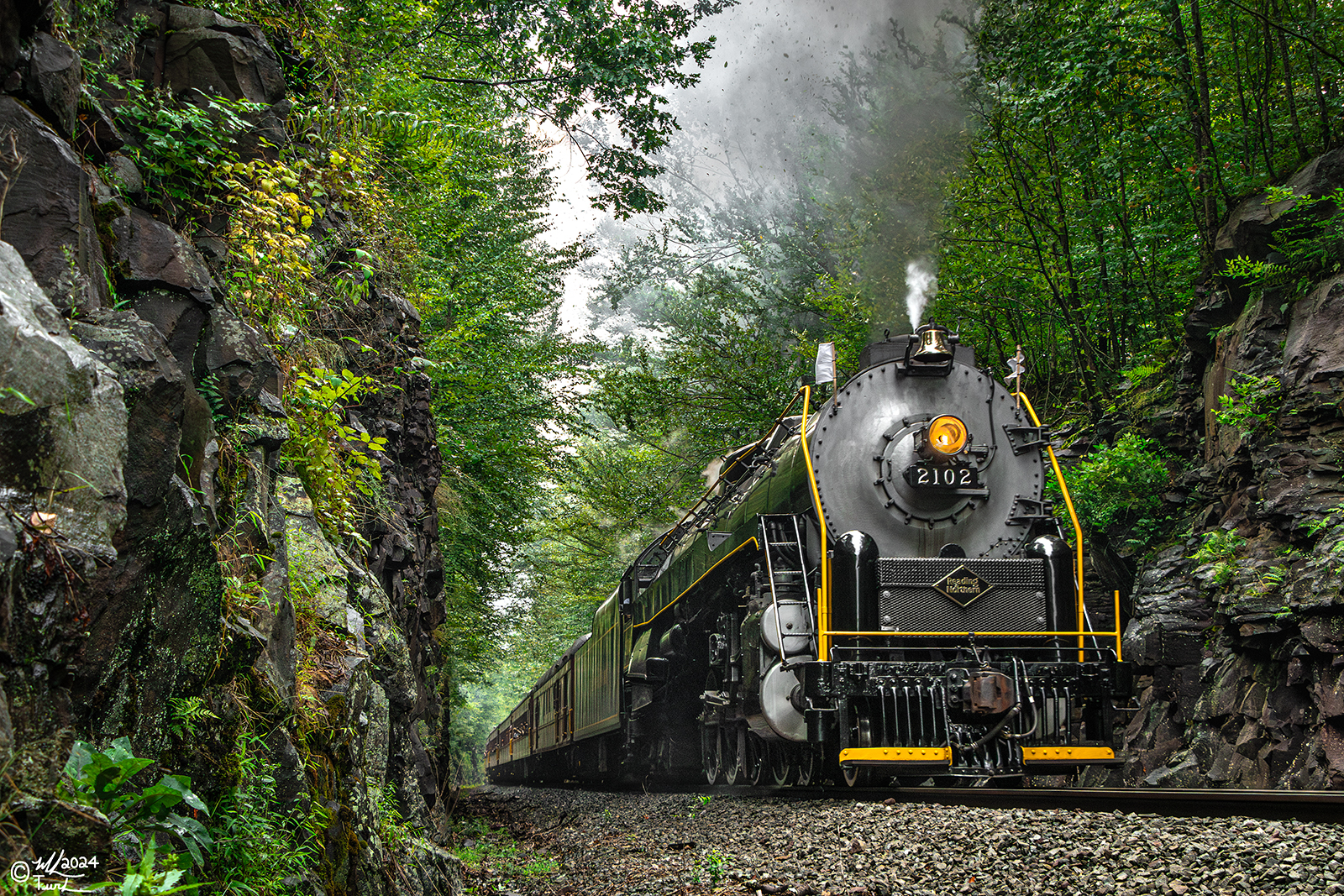 RDG 2102 is a class T-1 and  is pictured in White Haven, Pennsylvania, USA.  This was taken along the Neely's Cut on the Reading Company. Photo Copyright: Mark Turkovich uploaded to Railroad Gallery on 08/20/2024. This photograph of RDG 2102 was taken on Saturday, August 17, 2024. All Rights Reserved. 