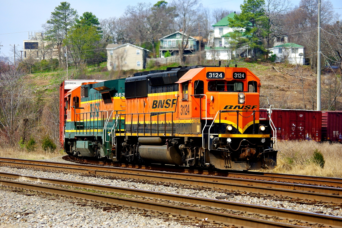 BNSF 3124 is a class EMD GP50 and  is pictured in Little Rock, Arkansas, USA.  This was taken along the Little Rock/UP on the BNSF Railway. Photo Copyright: Rick Doughty uploaded to Railroad Gallery on 08/23/2024. This photograph of BNSF 3124 was taken on Sunday, March 30, 2014. All Rights Reserved. 