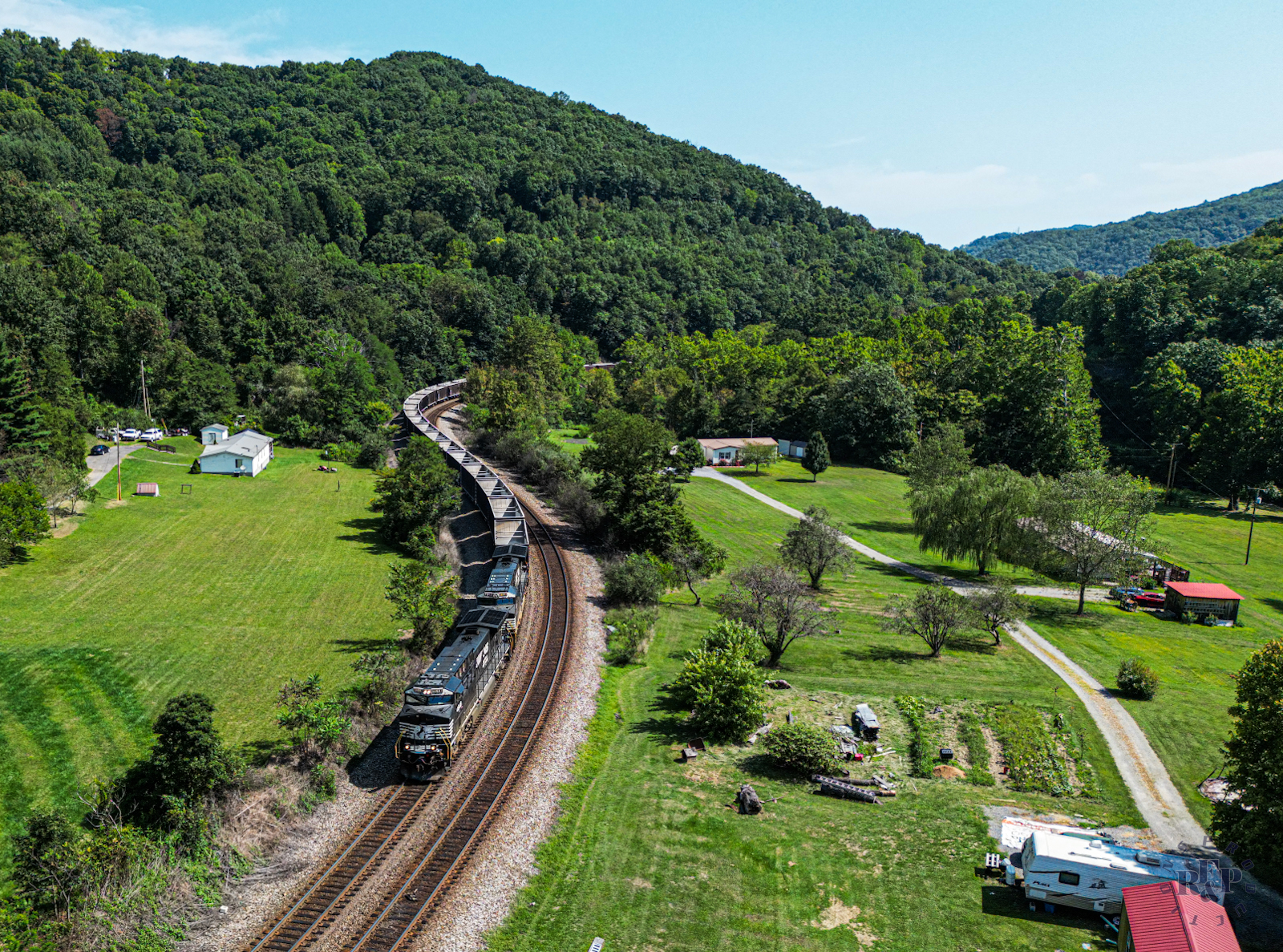 NS 4648 is a class GE AC44C6M and  is pictured in Willowton, West Virginia, USA.  This was taken along the Christiansburg District on the Norfolk Southern. Photo Copyright: RF&P Productions uploaded to Railroad Gallery on 08/24/2024. This photograph of NS 4648 was taken on Saturday, August 24, 2024. All Rights Reserved. 