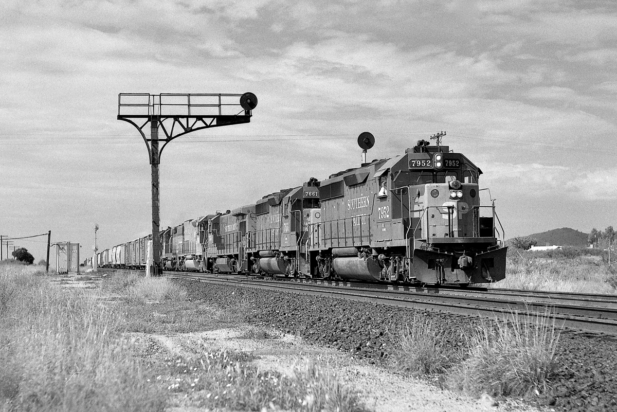 SP 7952 is a class EMD GP40-2 and  is pictured in Dragoon, Arizona, USA.  This was taken along the Lordsburg/SP on the Southern Pacific Transportation Company. Photo Copyright: Rick Doughty uploaded to Railroad Gallery on 08/26/2024. This photograph of SP 7952 was taken on Saturday, September 03, 1988. All Rights Reserved. 