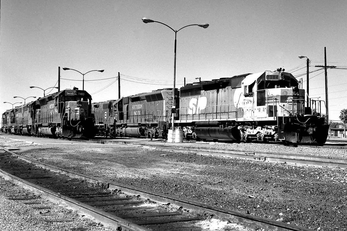 SP 7384 is a class EMD SD40 and  is pictured in Tucson, Arizona, USA.  This was taken along the Lordsburg/SP on the Southern Pacific Transportation Company. Photo Copyright: Rick Doughty uploaded to Railroad Gallery on 08/27/2024. This photograph of SP 7384 was taken on Thursday, October 15, 1987. All Rights Reserved. 