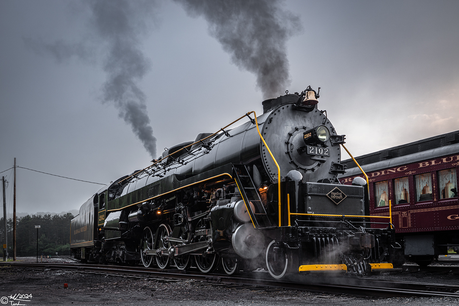 RDG 2102 is a class T-1 and  is pictured in Tunkhannock, Pennsylvania, USA.  This was taken along the Tunkhannock on the Reading Company. Photo Copyright: Mark Turkovich uploaded to Railroad Gallery on 09/02/2024. This photograph of RDG 2102 was taken on Saturday, June 22, 2024. All Rights Reserved. 