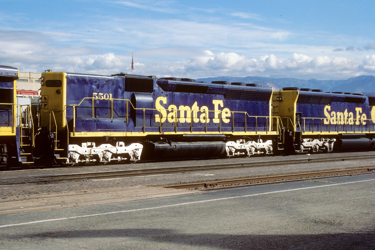 SF 5501 is a class EMD SD45 and  is pictured in San Bernardino, California, USA.  This was taken along the Cajon/SF on the Santa Fe. Photo Copyright: Rick Doughty uploaded to Railroad Gallery on 09/05/2024. This photograph of SF 5501 was taken on Thursday, November 13, 1986. All Rights Reserved. 