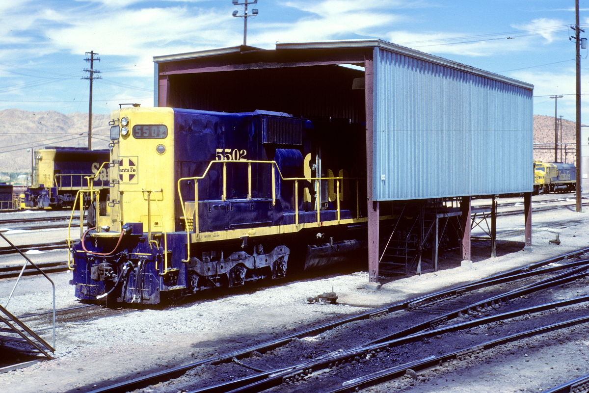 SF 5502 is a class EMD SD45 and  is pictured in Barstow, California, USA.  This was taken along the Barstow/SF on the Santa Fe. Photo Copyright: Rick Doughty uploaded to Railroad Gallery on 09/05/2024. This photograph of SF 5502 was taken on Wednesday, August 07, 1985. All Rights Reserved. 