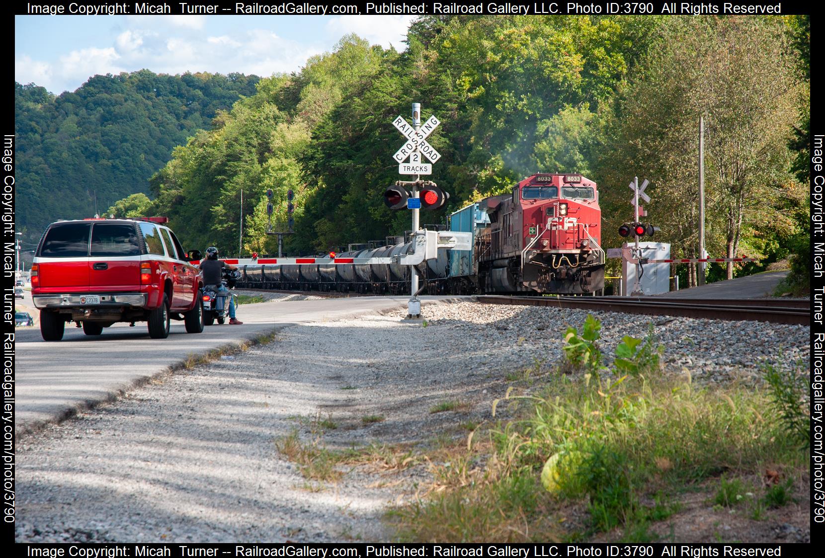 CP 8033 is a class GE AC4400CW and  is pictured in Pikeville, Kentucky, USA.  This was taken along the Big Sandy Subdivision on the CSX Transportation. Photo Copyright: Micah  Turner uploaded to Railroad Gallery on 09/15/2024. This photograph of CP 8033 was taken on Saturday, September 14, 2024. All Rights Reserved. 